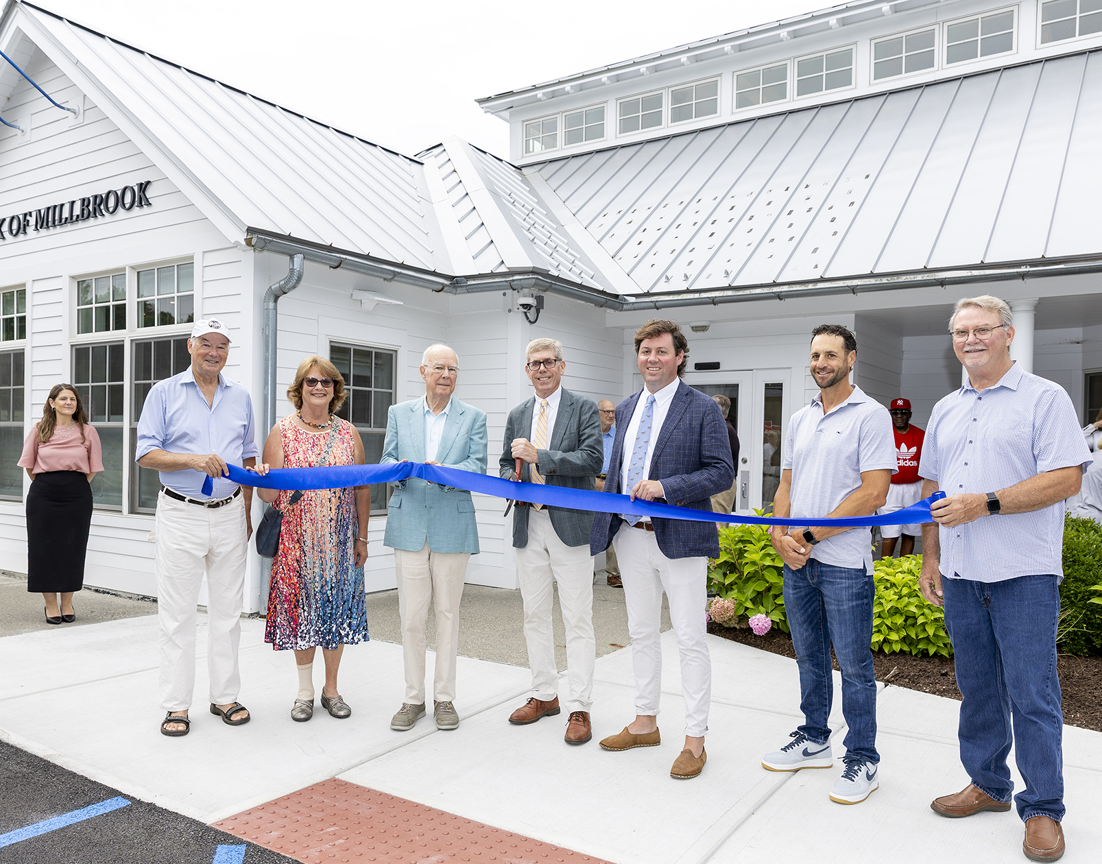 Ribbon Cutting on Saturday, August 16th. Pictured L-R: Christopher Kennan, Town Supervisor; LanaMorrison, Deputy Town Supervisor; Farnam Collins, Bank of Millbrook Director; George Whalen III, Presi- dent and Chairman of the Board, Bank of Millbrook; George Whalen IV, Senior Vice President of Lending; Chris Colomello, Ducillo Construction; and Rob Cooper, Bank of Millbrook Director.with Chrissy Baker and Lourdes Bermudez.